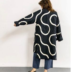 Haptic Lab longline snakepath quilted coat